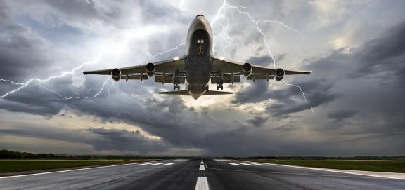 plane taking off during storm
